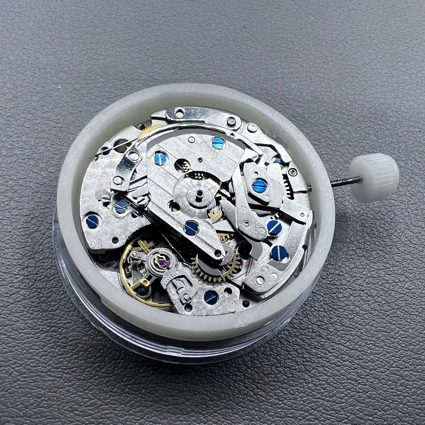 Close-up of Chinese 7750 automatic chronograph movement with day date at 3, ETA 7750 style mechanism