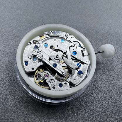 Close-up of Chinese 7750 automatic chronograph movement with day date at 3, ETA 7750 style mechanism