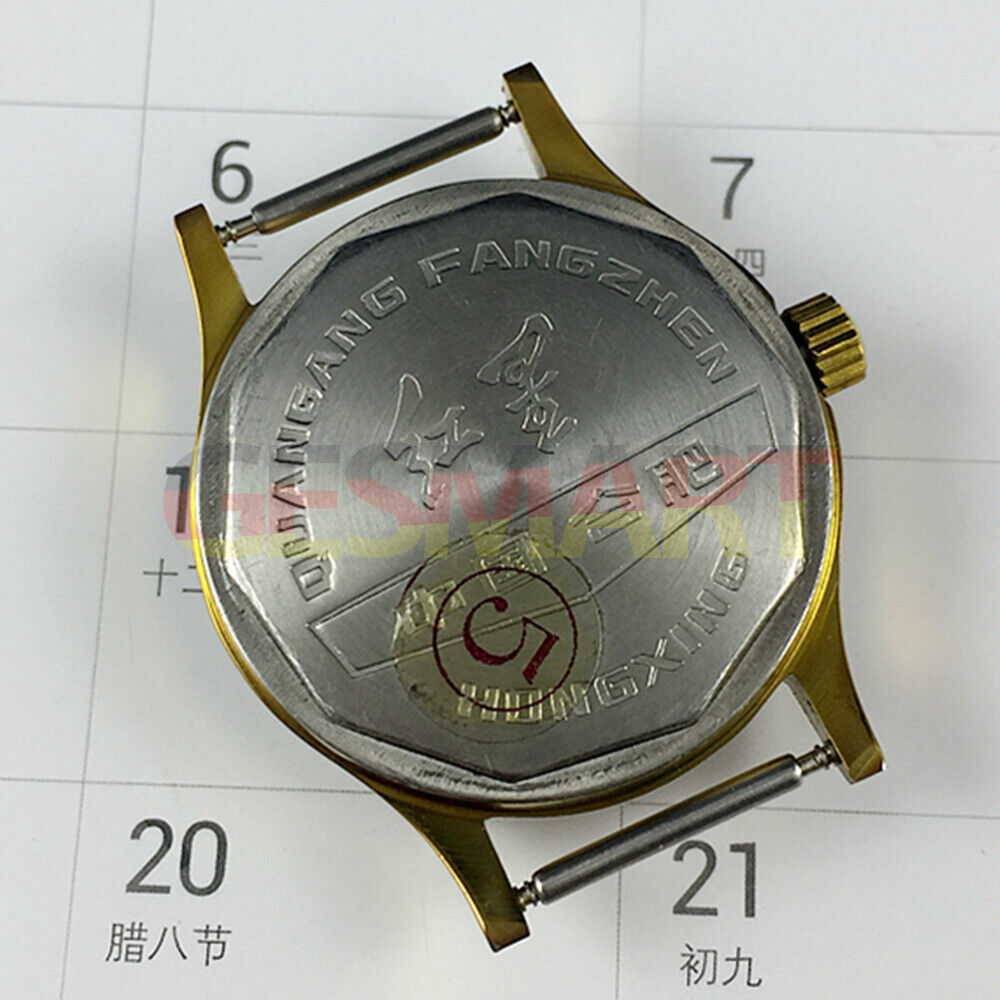33mm Chinese manual watch with silver dial, golden nails, and round gold case, classic style.