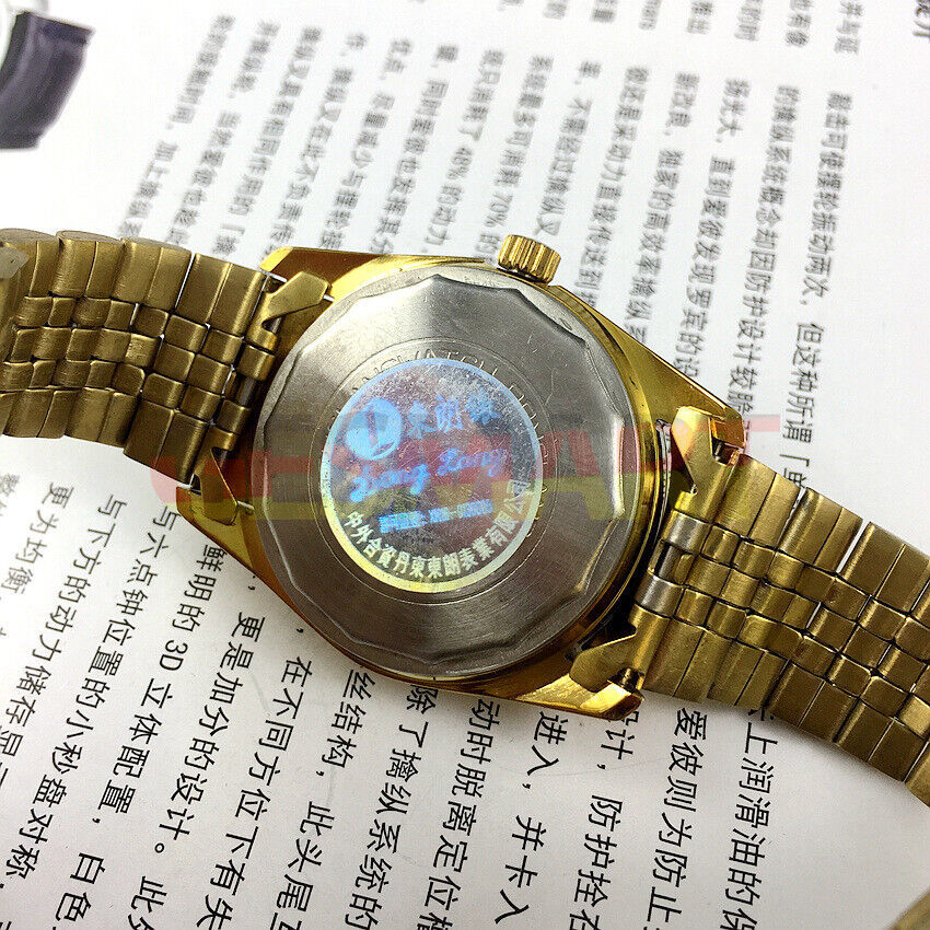 Donglang 36mm manual mechanical watch, silver dial, 17 jewels, with single calendar display.