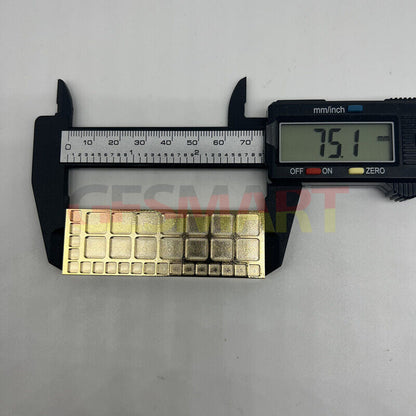 Copper golden 75mm tray with 33 square compartments, perfect for organizing screws in watch repair kits.