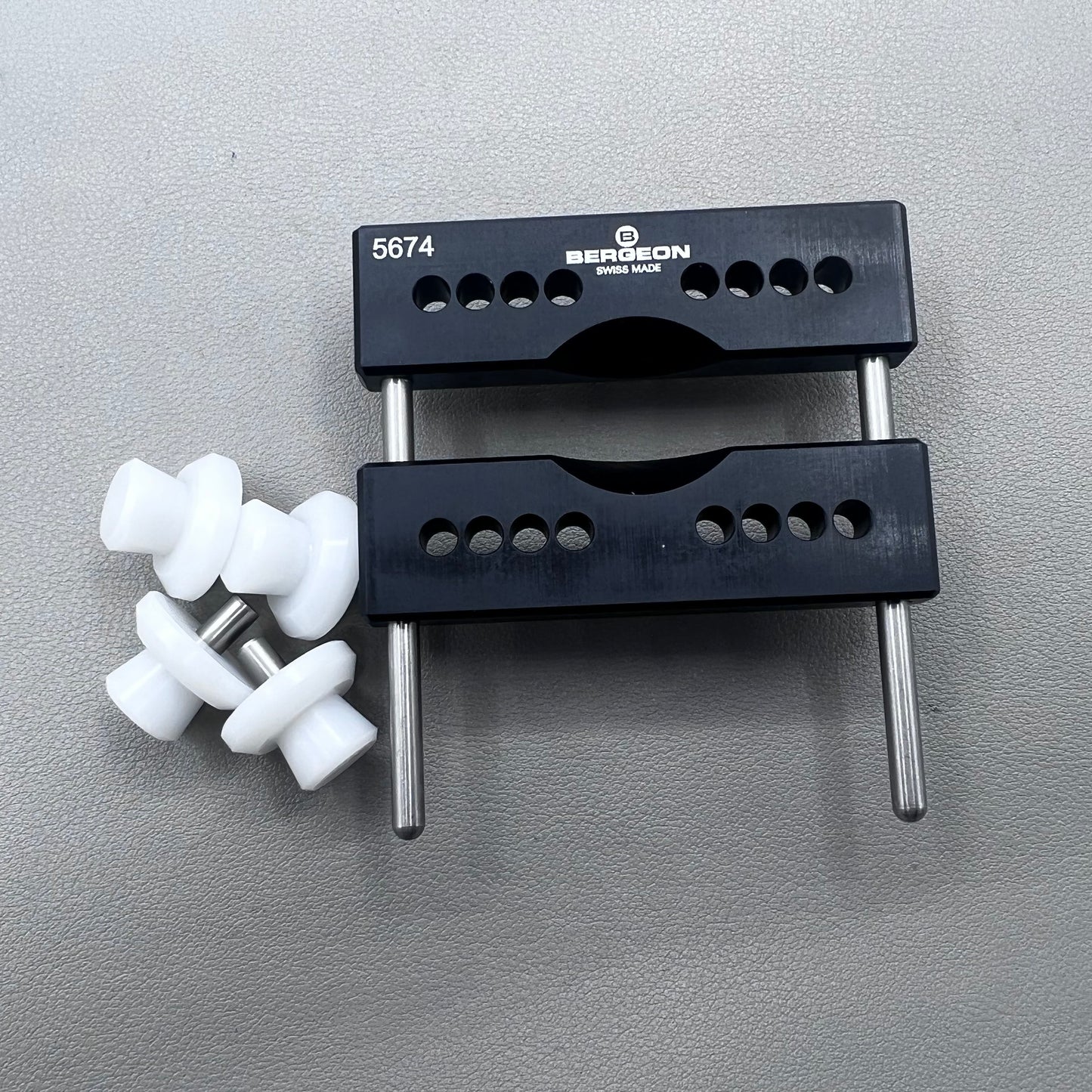Swiss Bergeon 5674 vise jaws holder for secure watch case clamping, ideal for precise repair tasks.