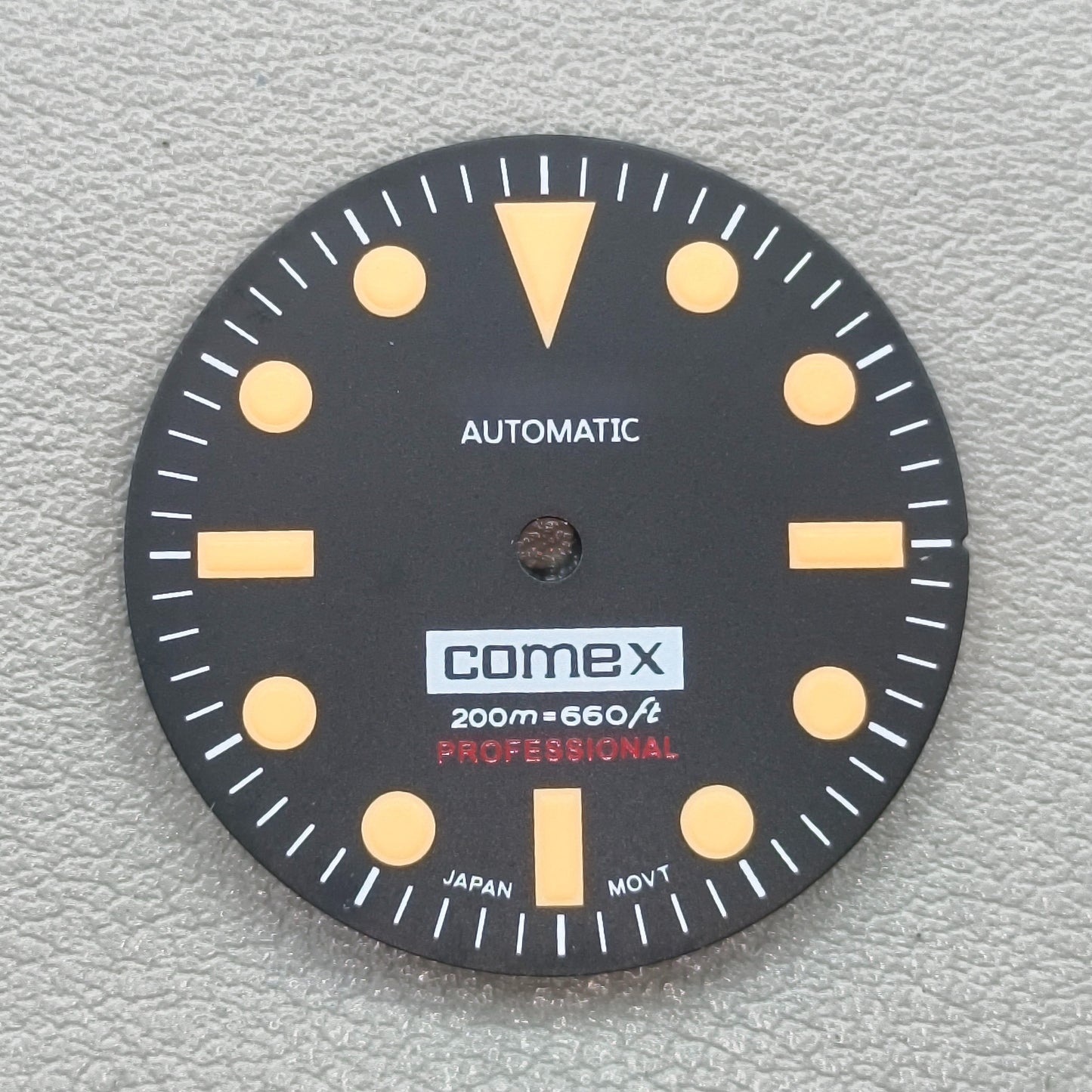 watch dial with S logo