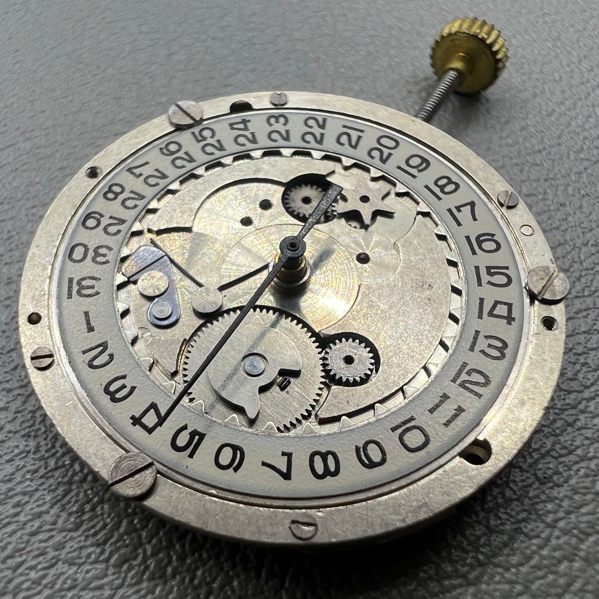 Swiss P-2460 quartz watch movement with 3 hands, precise timekeeping for watch repairs and accessories.