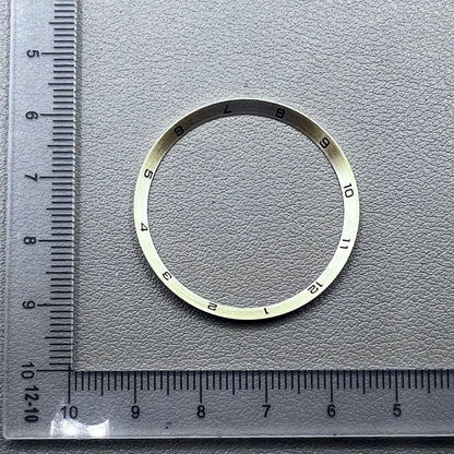 Golden stainless steel chapter ring for watches, 34.9x31.0x1.9mm, durable accessory.