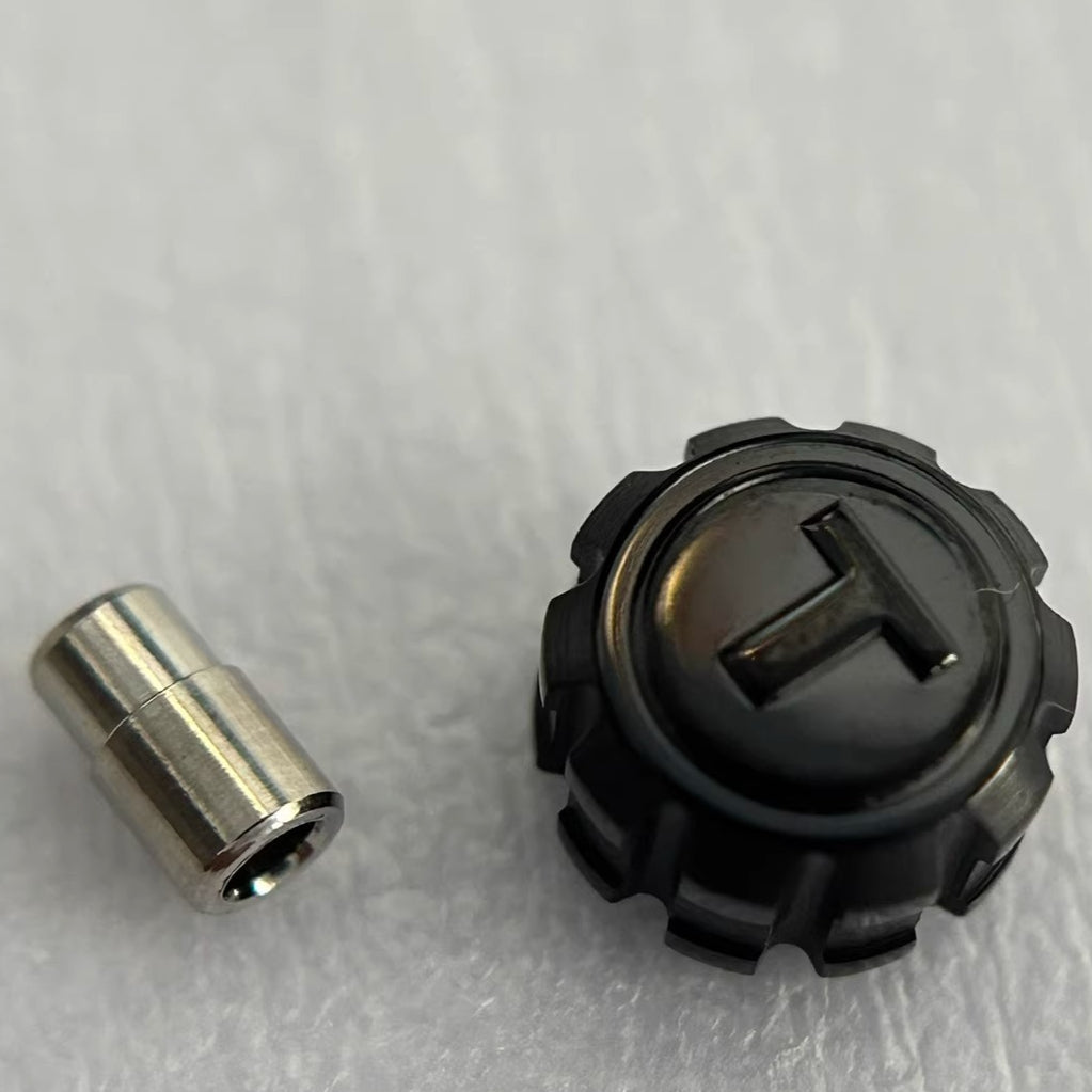 Steel black watch crown replacement part for Tissot T095417, durable accessory for watch repair and maintenance.