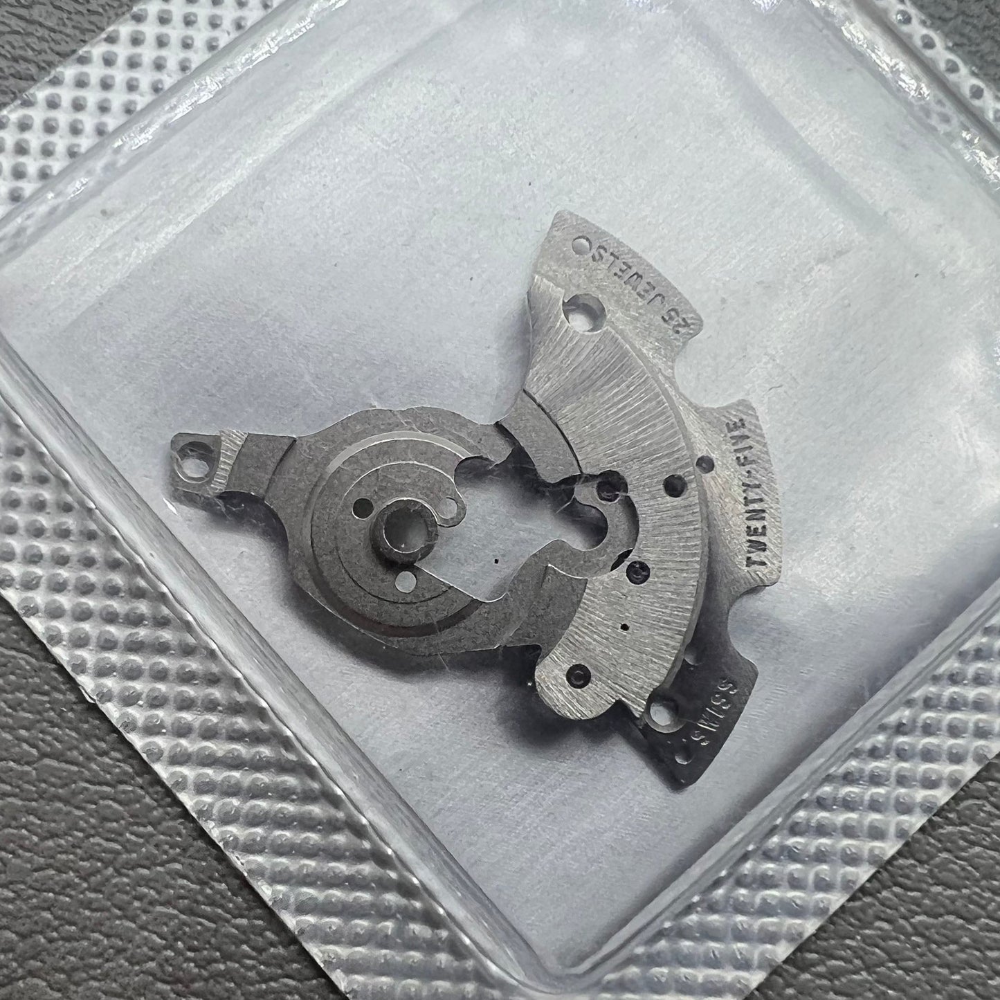 Original SW300-1134 automatic watch movement bridge and wheel by Swiss Echte for SW300 caliber.
