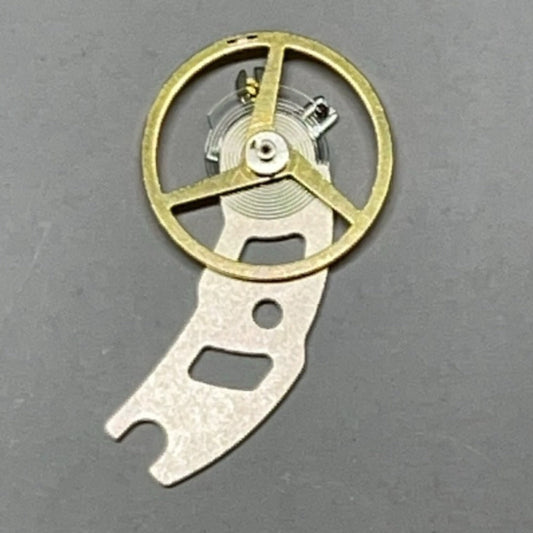 Pièce démontée, balancier complet avec attelle pour montre <tc>ETA</tc> C01.211
