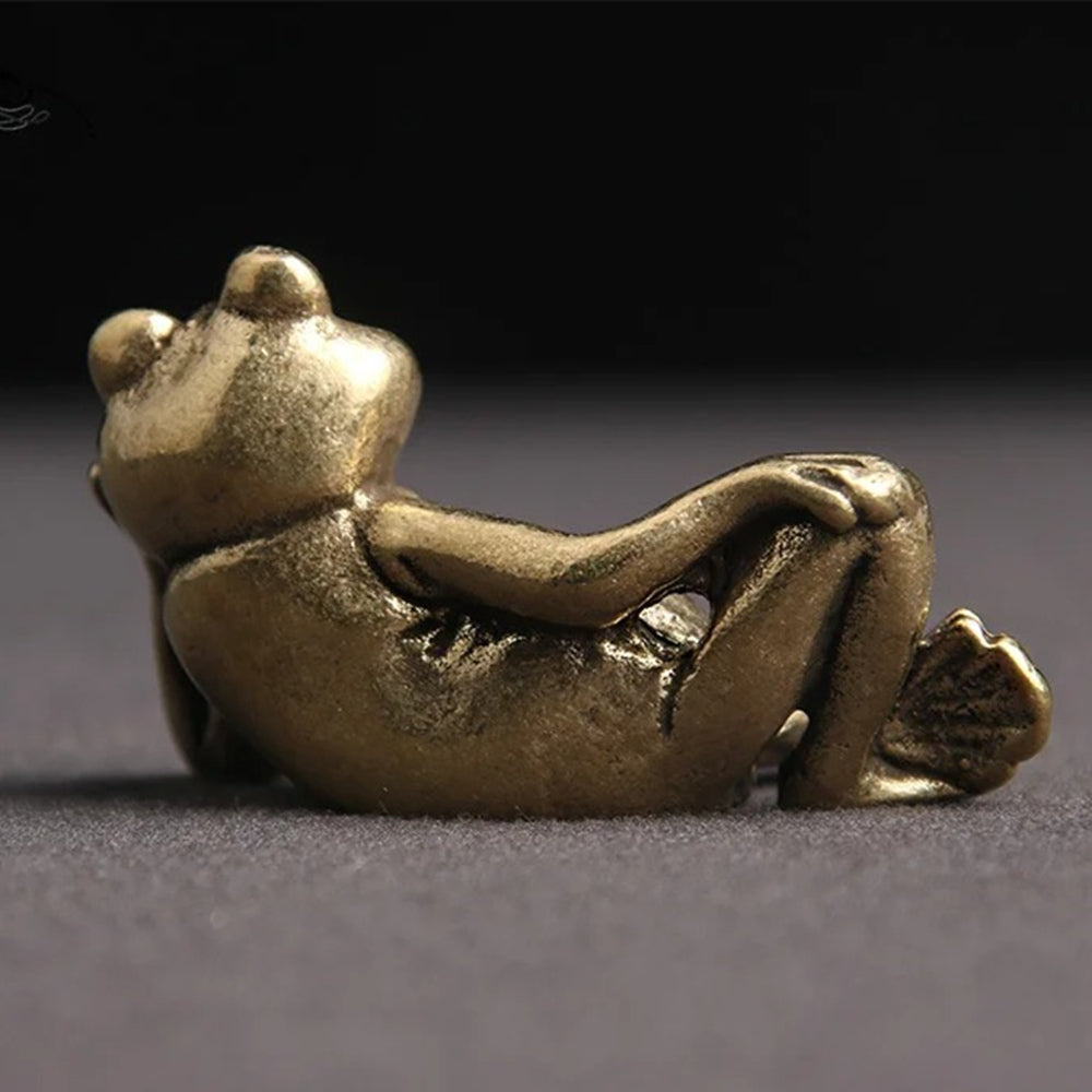 Hand-carved solid copper sleeping frog trinket in vintage bronze finish, perfect for watch accessory displays.