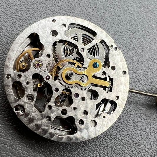 Hangzhou 2189 Silver watch with hollow mechanical movement and single calendar display accessory.