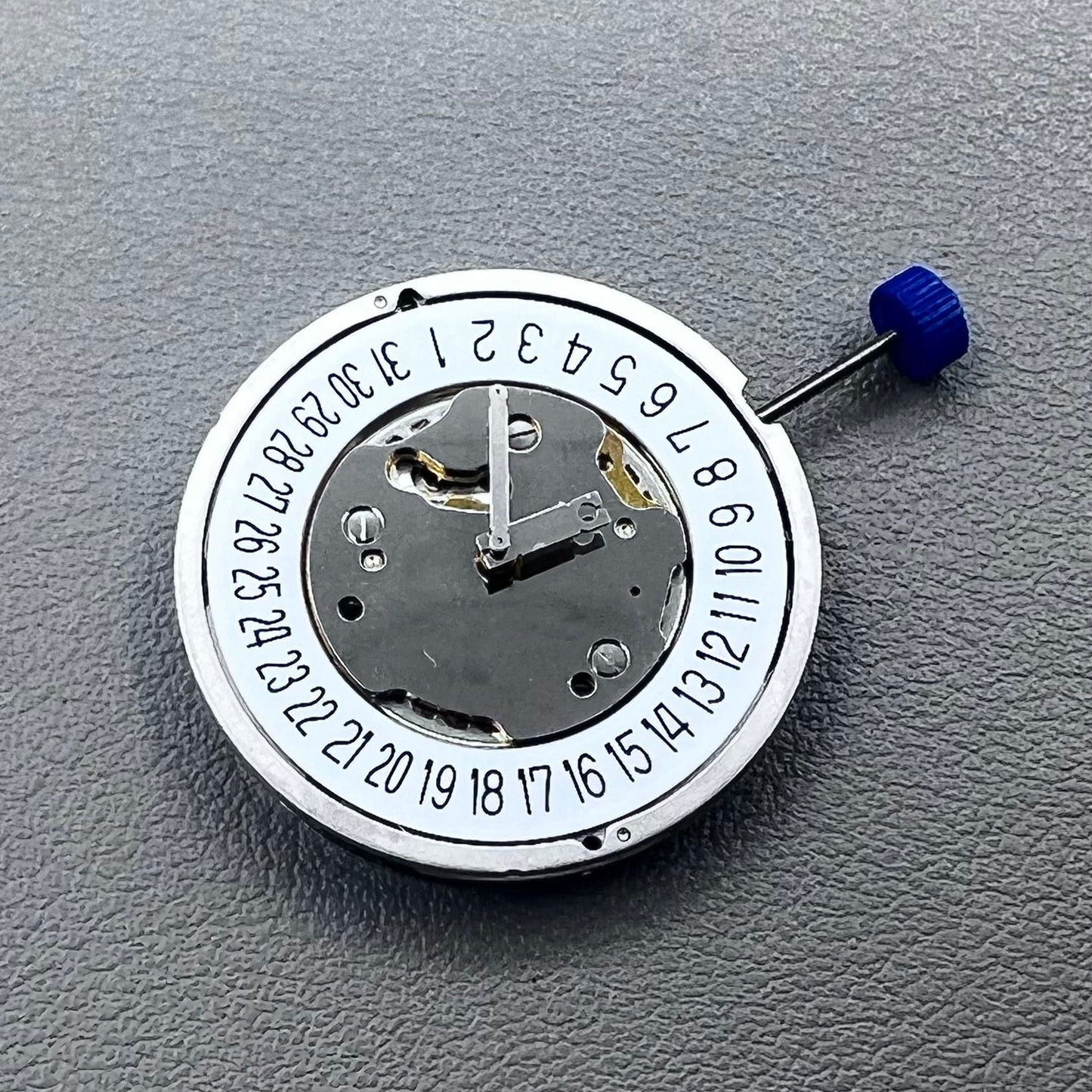 Swiss Ronda 5021D quartz movement with date display at 6 o'clock, precise watch accessory by Ronda.