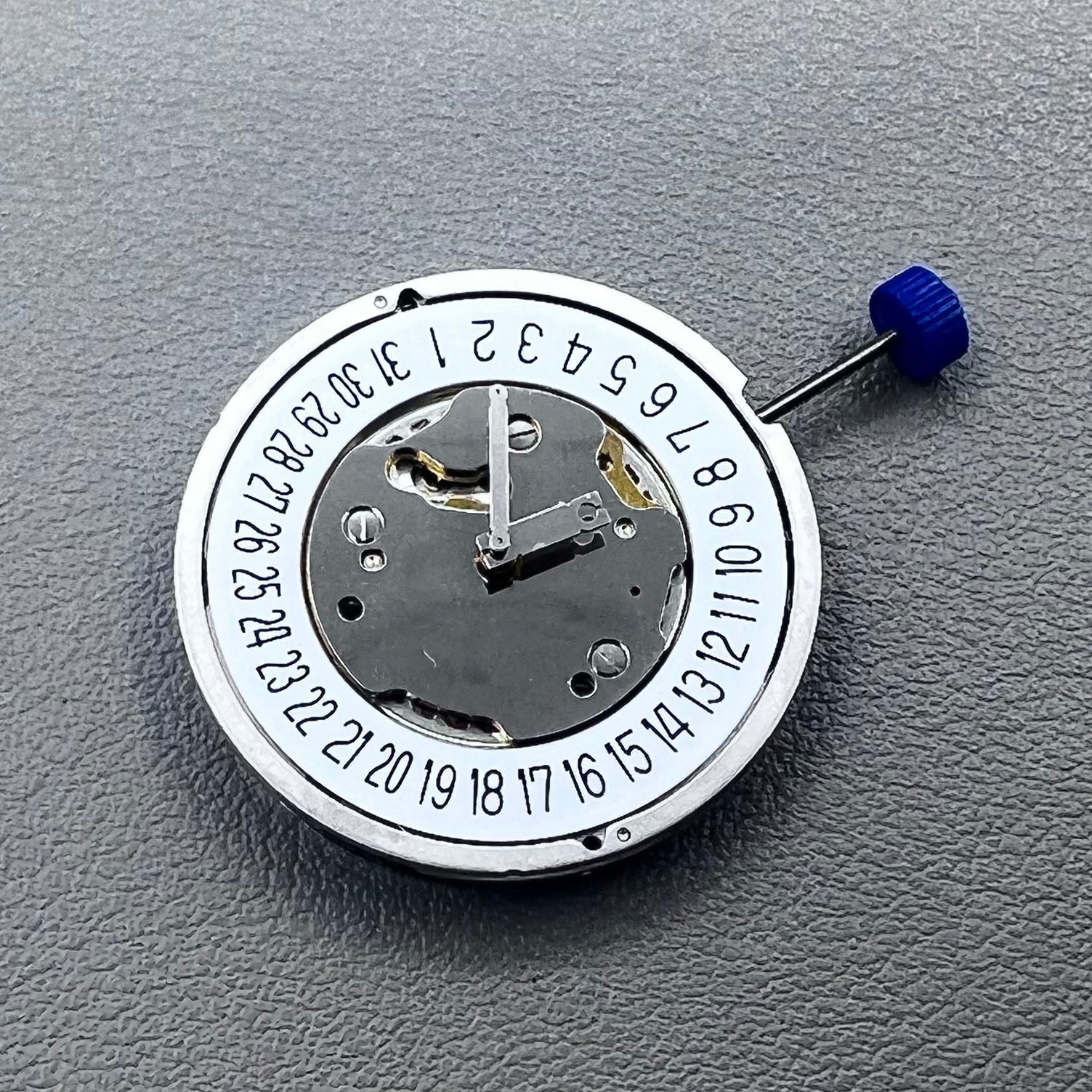 Swiss Ronda 5021D quartz movement with date display at 6 o'clock, precise watch accessory by Ronda.