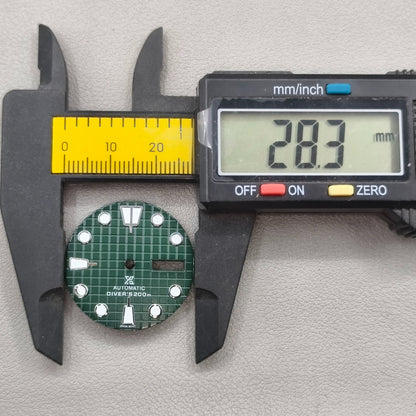 watch dial with S logo