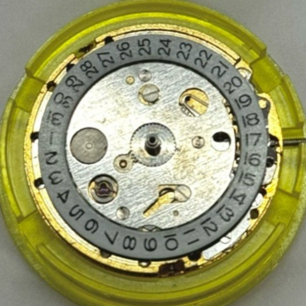 China Made 8205 2813 mechanical watch movement with single calendar and red date wheel for precision timekeeping.