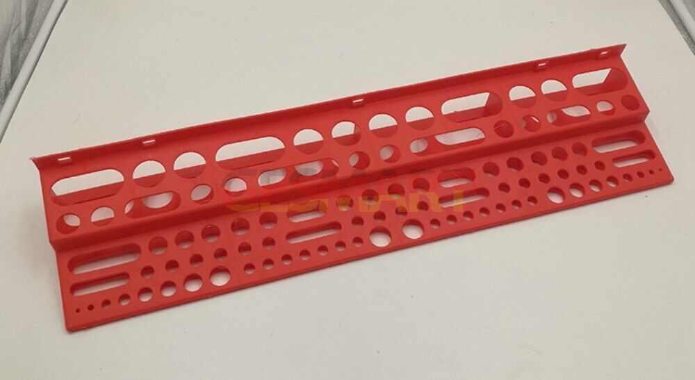 Wall-mounted hardware board with screwdriver and pliers storage for organized watch accessory tools.