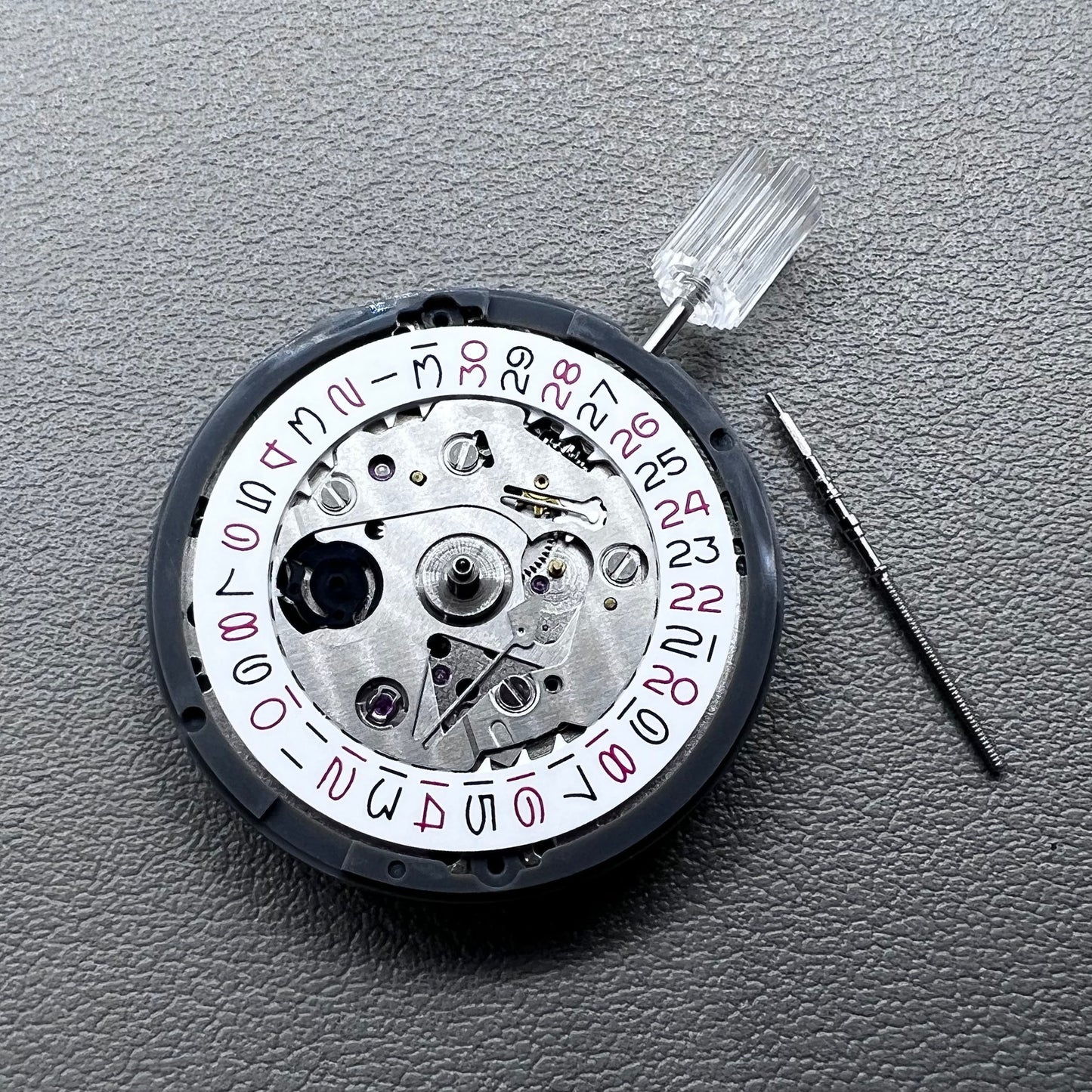 Seiko NH35 watch accessory showcasing red even number dial with high-accuracy automatic mechanical movement.