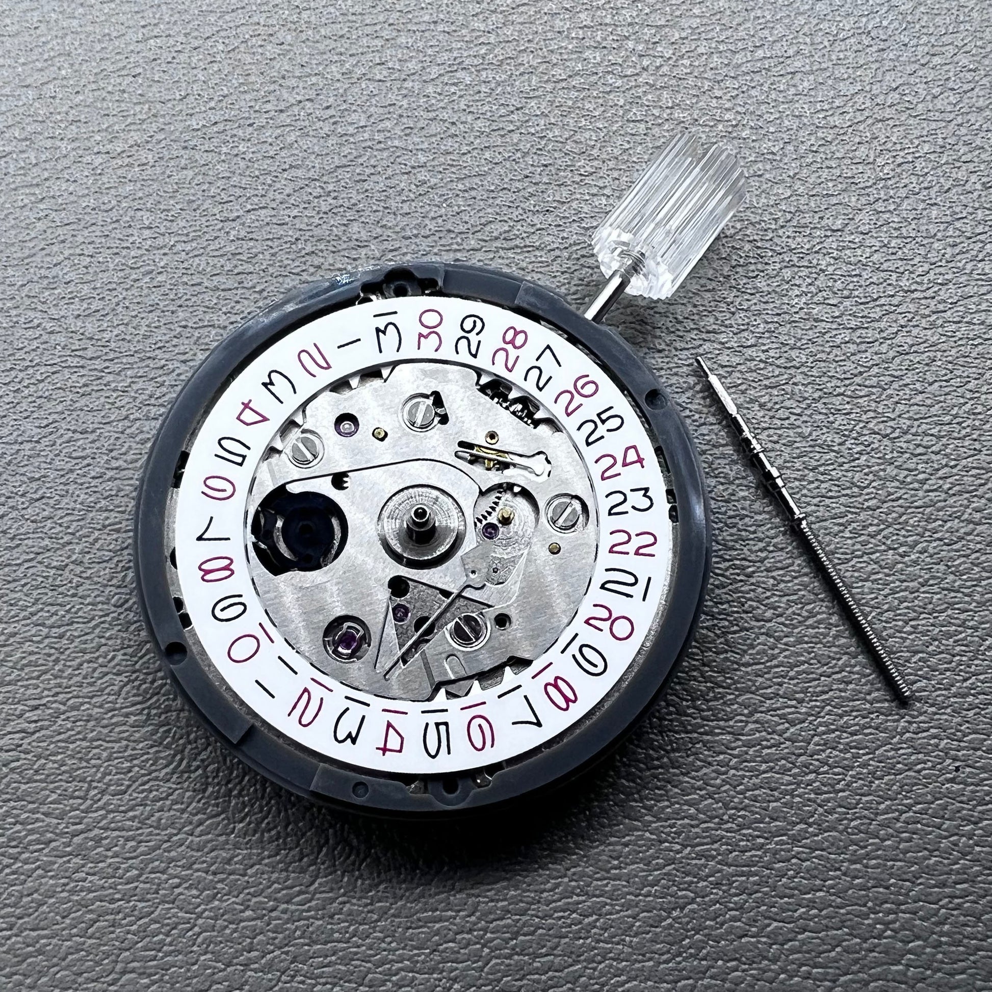 Seiko NH35 watch accessory showcasing red even number dial with high-accuracy automatic mechanical movement.