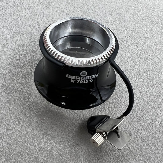 Swiss Bergeon 7913 3.3x magnifying eyeglass clip for precise watch accessory repairs and adjustments.