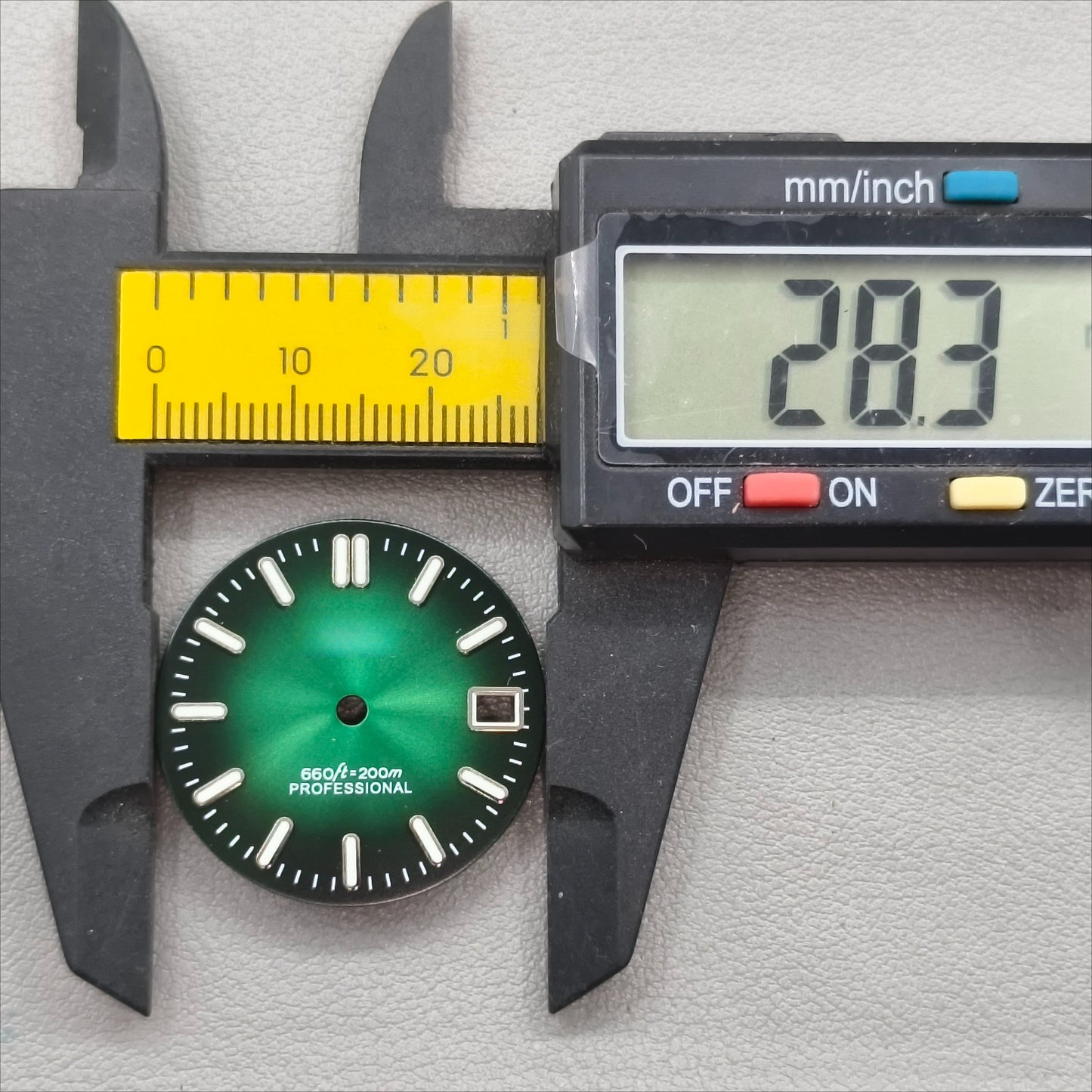 watch dial with S logo