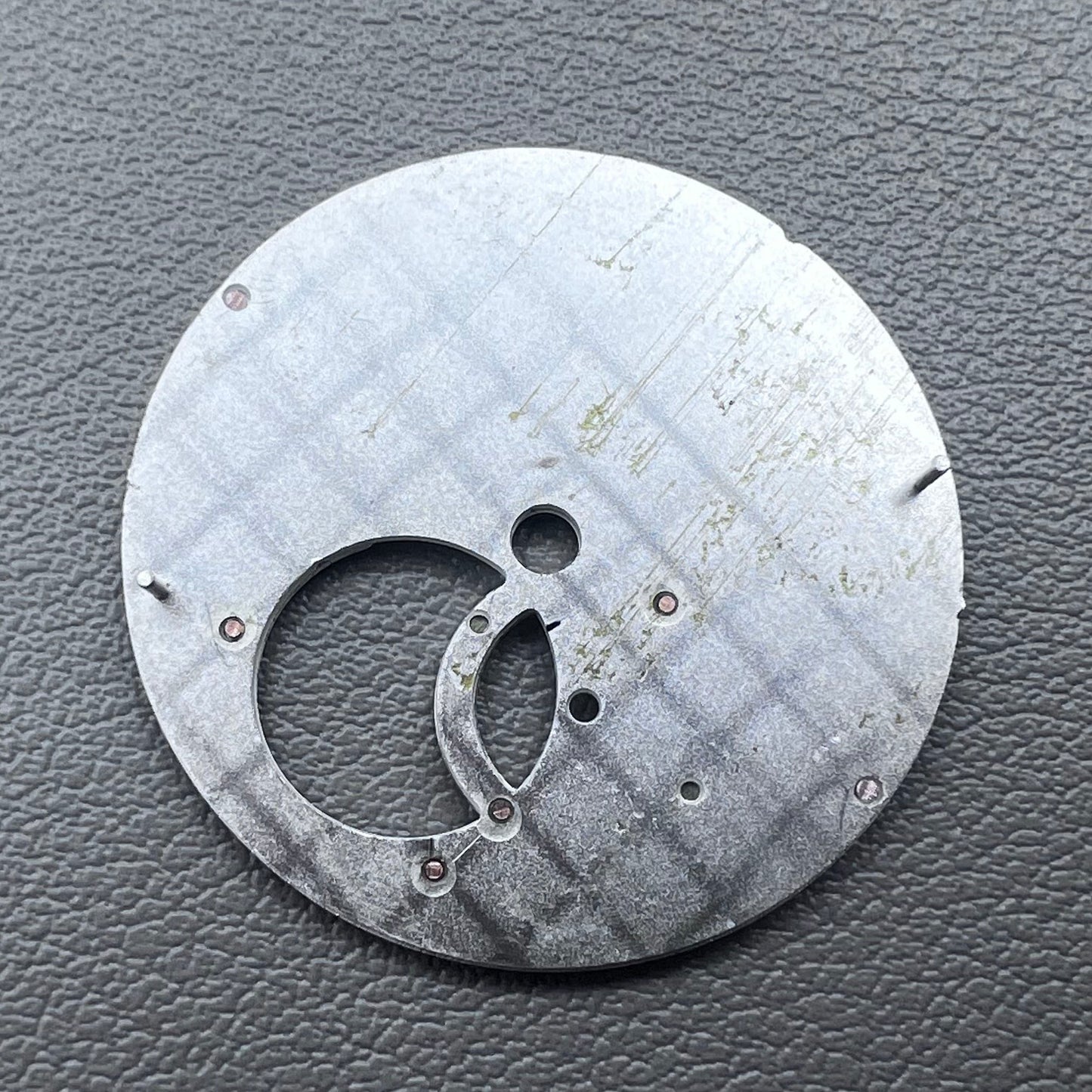 Silver 28.5mm modified hollow diving watch dial for NH39, sleek design.