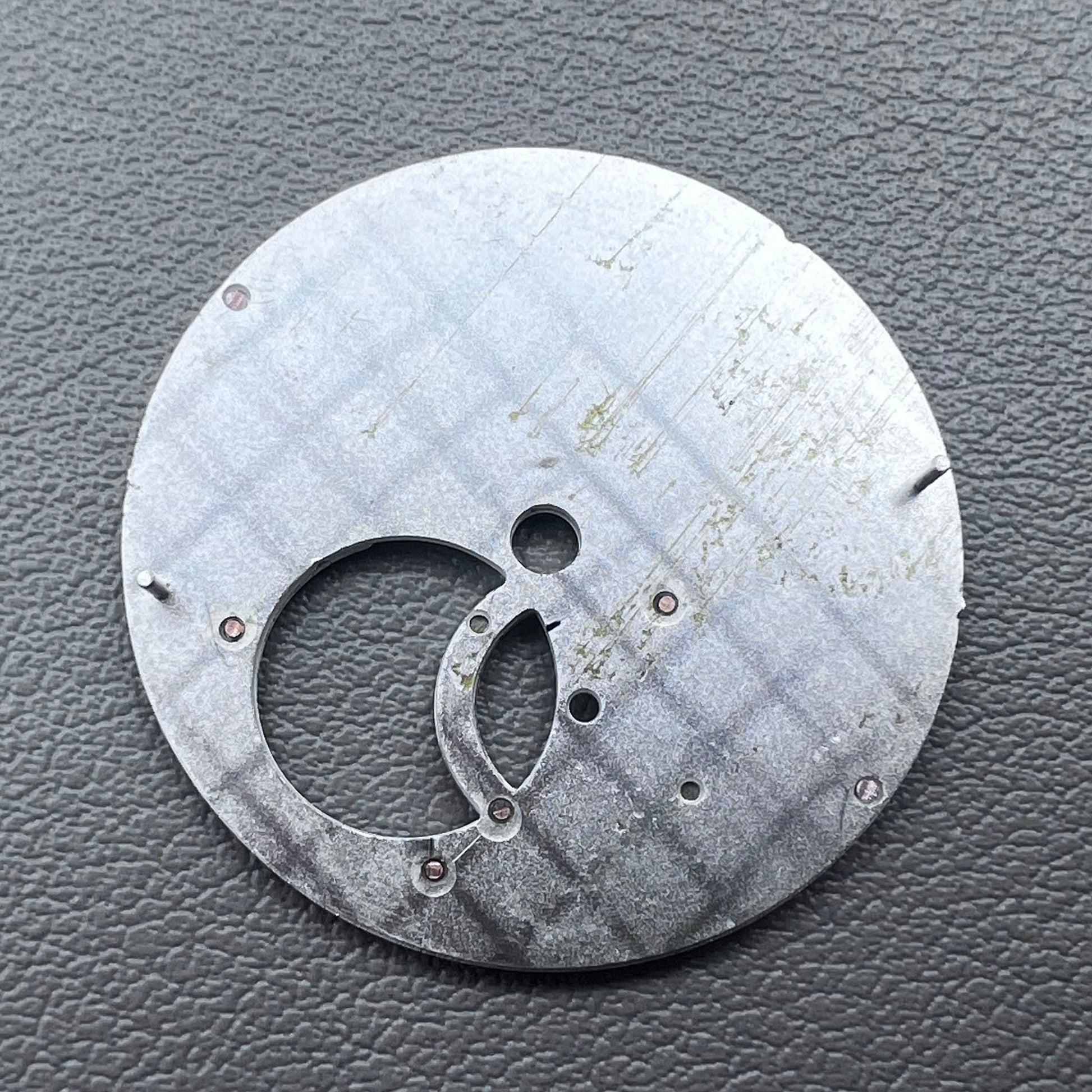 Silver 28.5mm modified hollow diving watch dial for NH39, sleek design.