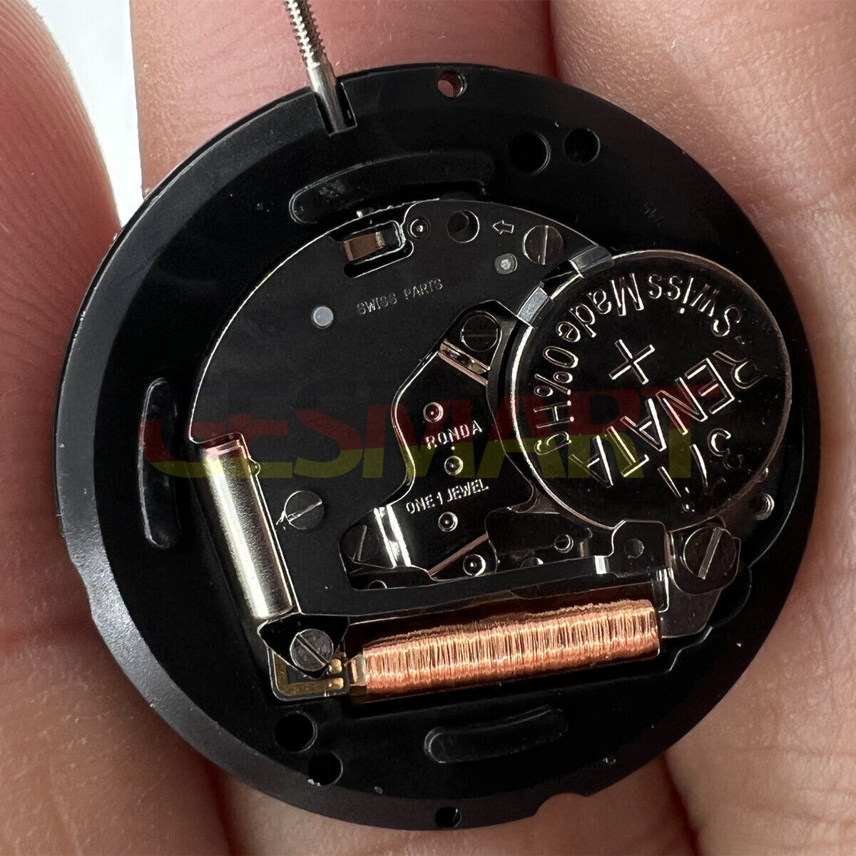 Swiss Part Ronda 715 quartz watch movement with black date wheel at 6 o'clock, precision replacement part for watches.