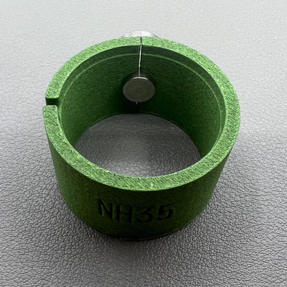 Watch movement holder securely holding Seiko NH35 movement for precise assembly and repair.