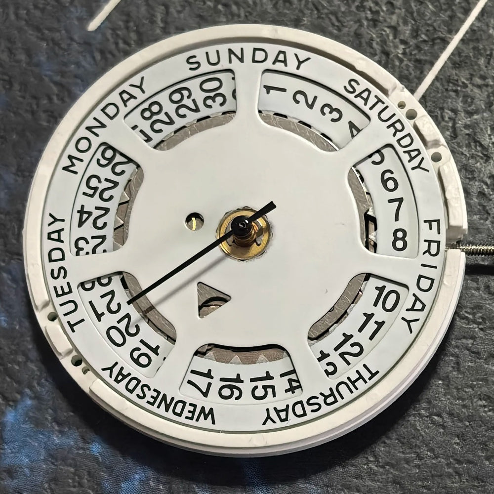 Swiss Made ISA 1198 quartz movement day date watch repair part for precise watch maintenance.