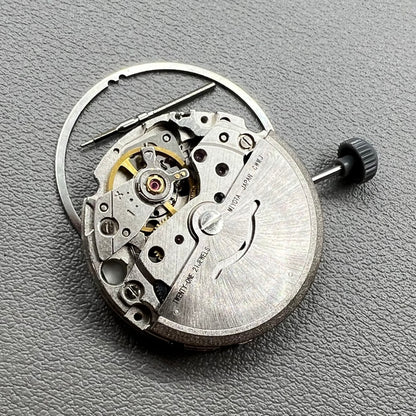 Close-up of Japan Miyota 8200 movement with single date display at 3 o'clock on watch accessory.