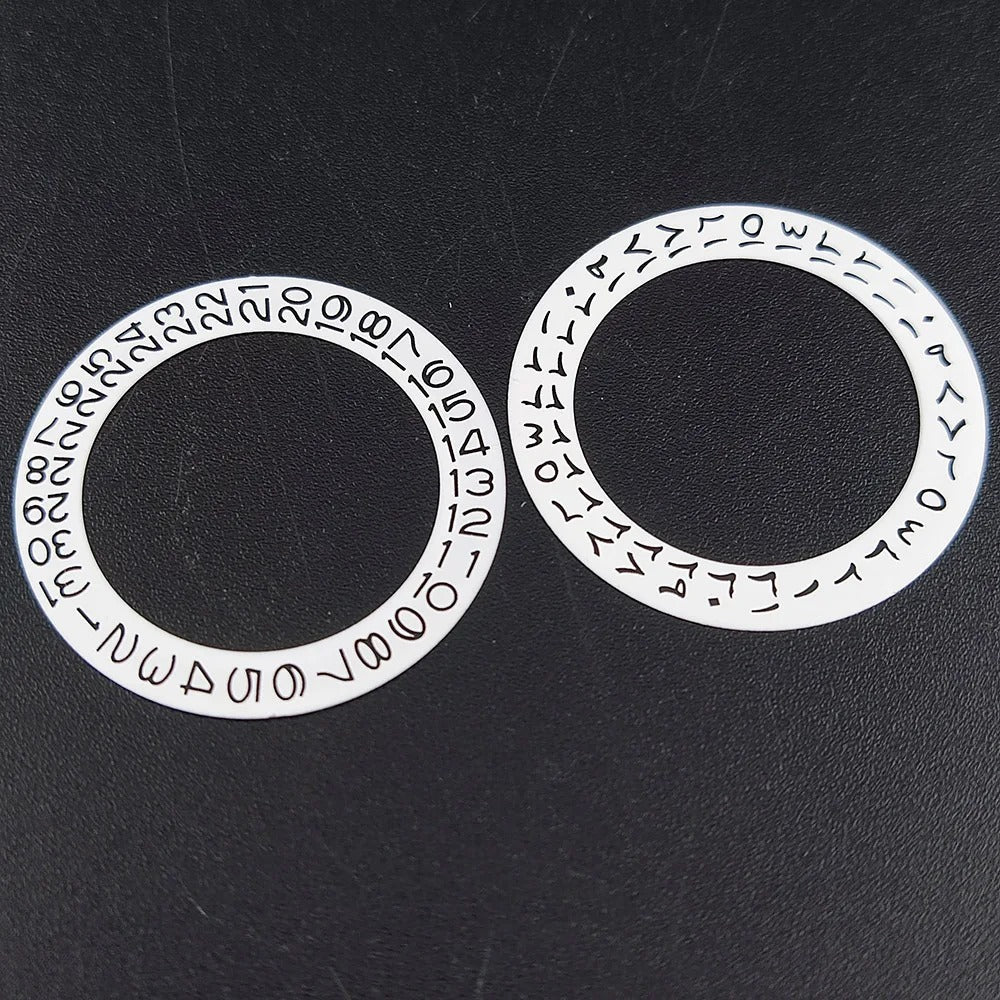 NH 35 watch calendar movement replacement parts with date and day wheel discs.