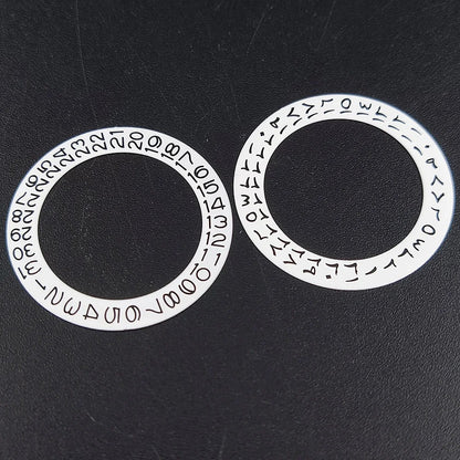 NH 35 watch calendar movement replacement parts with date and day wheel discs.