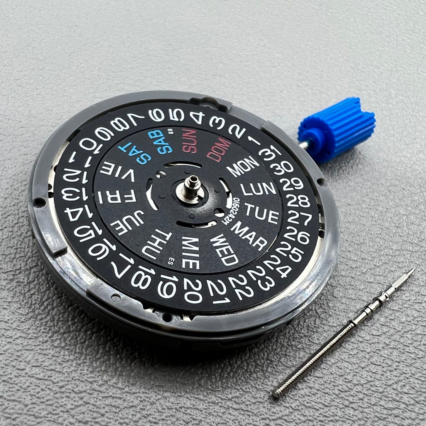 Seiko NH36A watch movement with black day wheel and English font, crown positioned at 3 o'clock