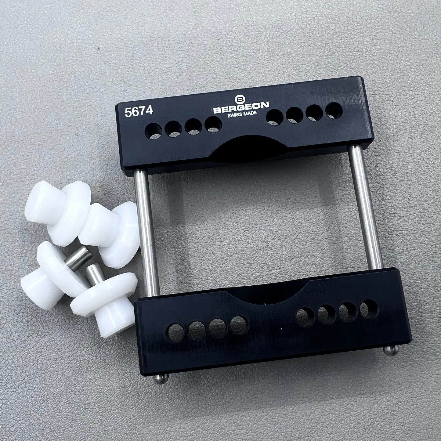 Swiss Bergeon 5674 vise jaws holder for secure watch case clamping, ideal for precise repair tasks.