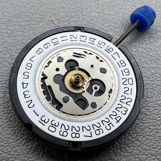 Swiss ETA 804.111 quartz movement with 3 hands, precision watch accessory for repairs and upgrades.