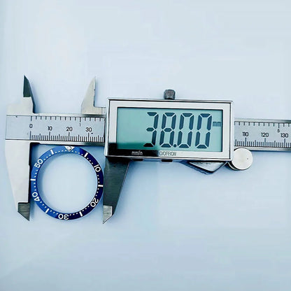 Flat ceramic bezel insert 38mm with luminous markers for precise watch accessory replacement.