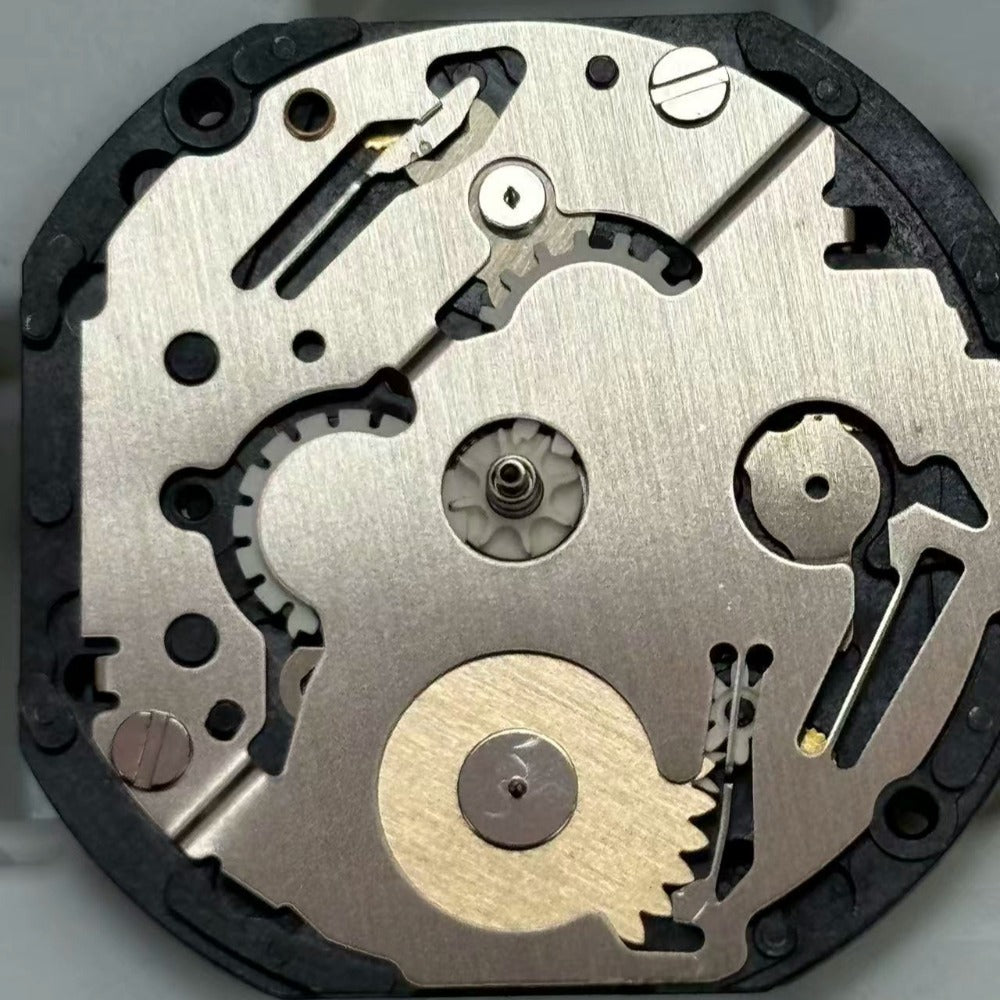 Original Japan Made VX36 quartz watch movement with small hands positioned at 3 and 9.