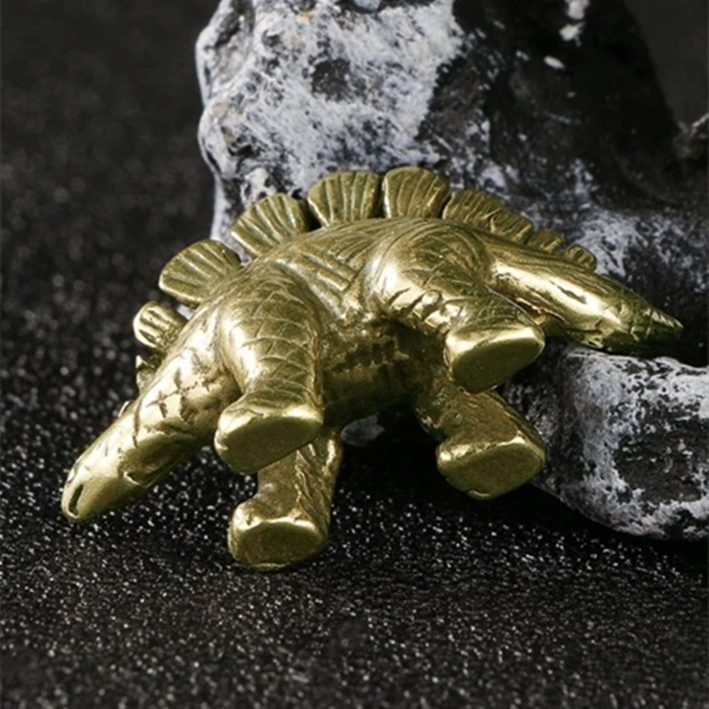 Vintage hand-carved solid copper Spinosaurus trinket, detailed bronze collectible figurine.