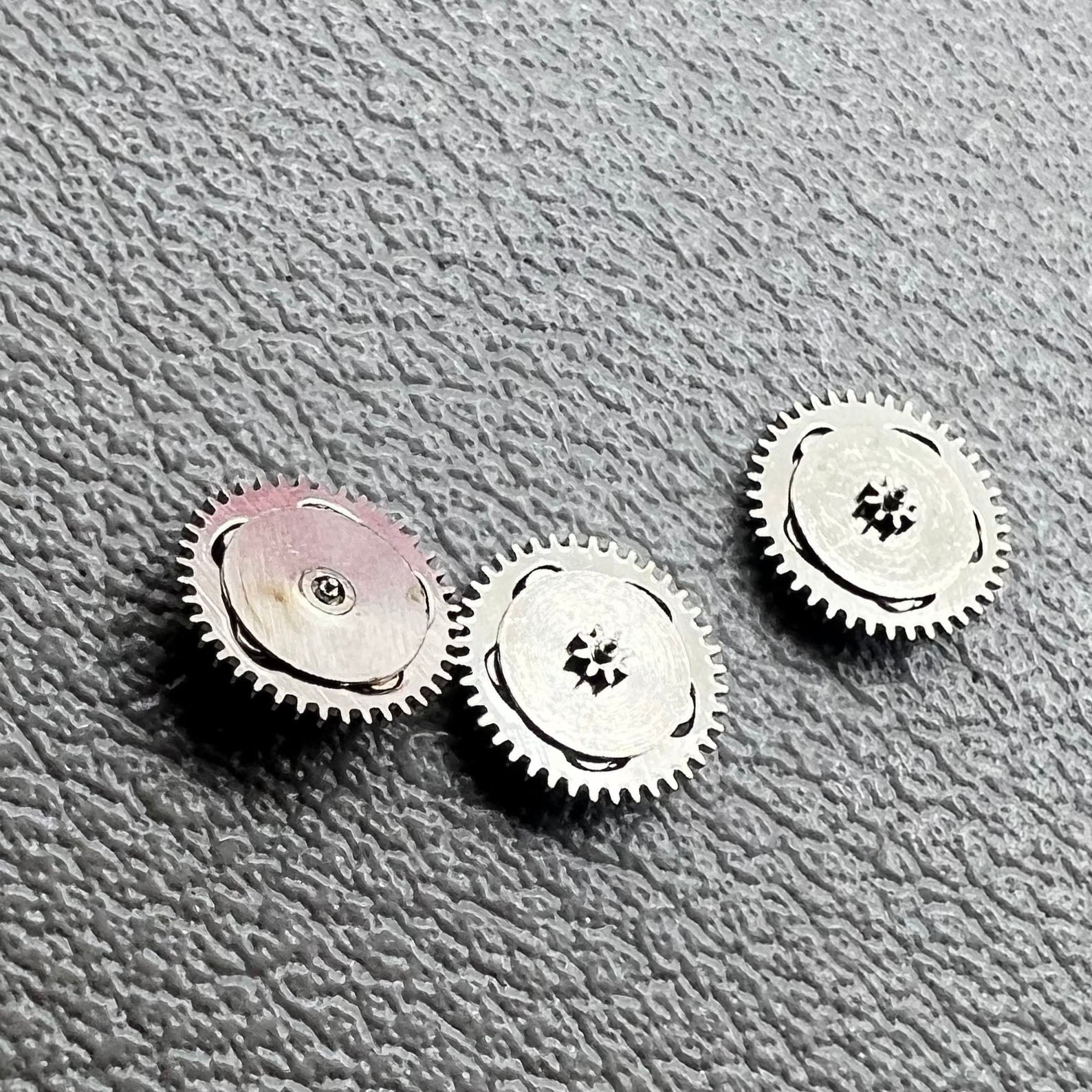 Set of 5 silver reversing wheels for Shanghai 7120 movement, compatible with China-made watches.