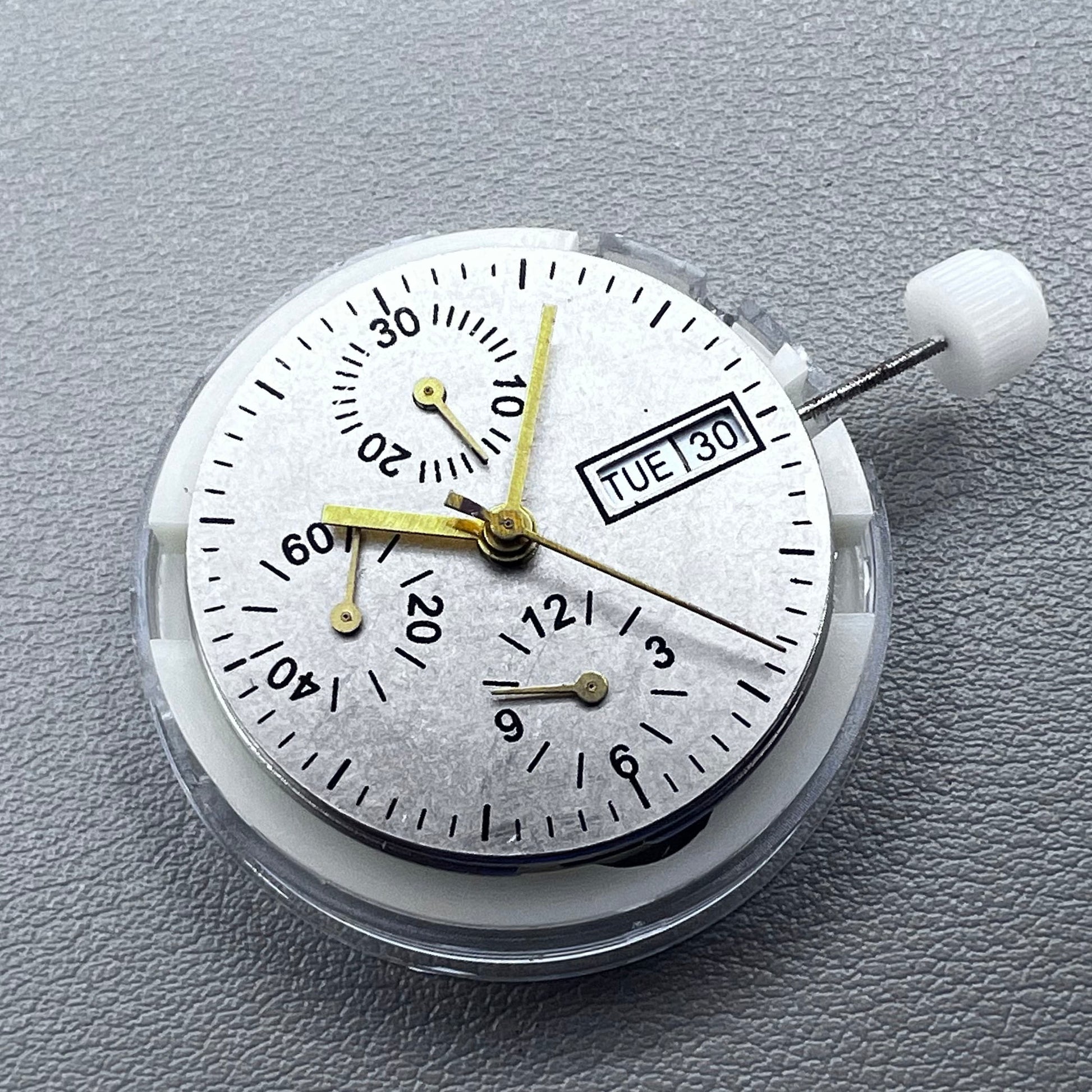 Close-up of Chinese 7750 automatic chronograph movement with day date at 3, ETA 7750 style mechanism