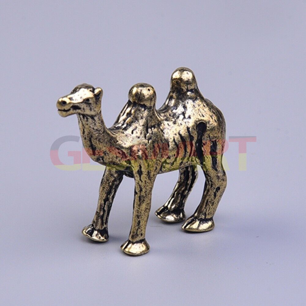 Hand-carved solid copper camel trinket with vintage bronze finish, perfect for watch accessory display.