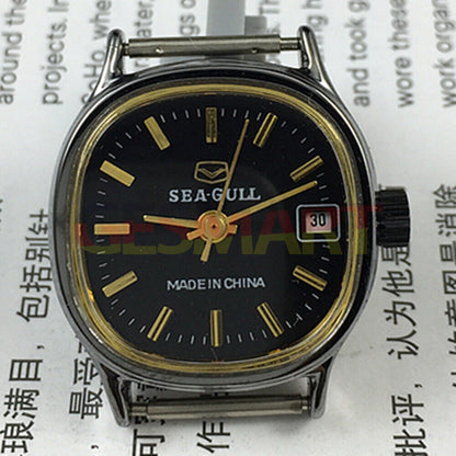26mm Seagull black case lady watch with golden markers, manual mechanical movement, and calendar display.