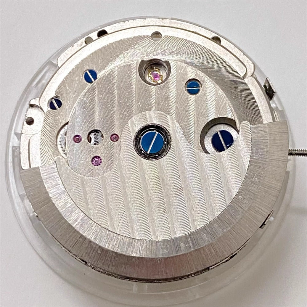 Shanghai brand watch accessory with multifunctional mechanical movement and 4 hands displaying weekly calendar at 12 o'clock.