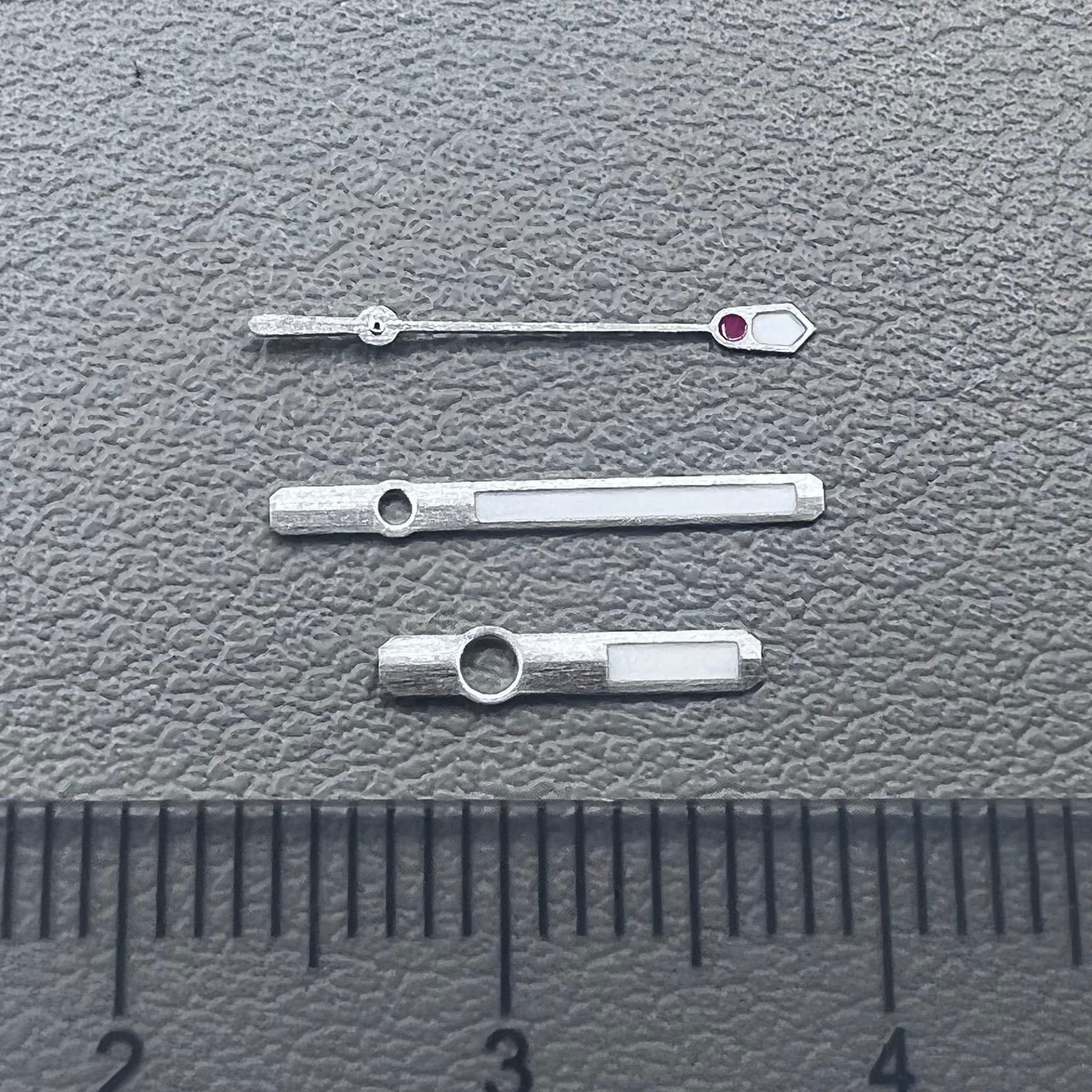 Three green luminous watch hands set for NH35A NH36A movement, enhancing visibility and style, brand B22.