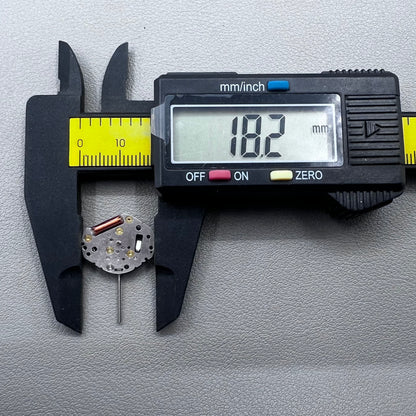 Japan Y481.F quartz watch with 3 hands, precise timekeeping, sleek silver dial design.