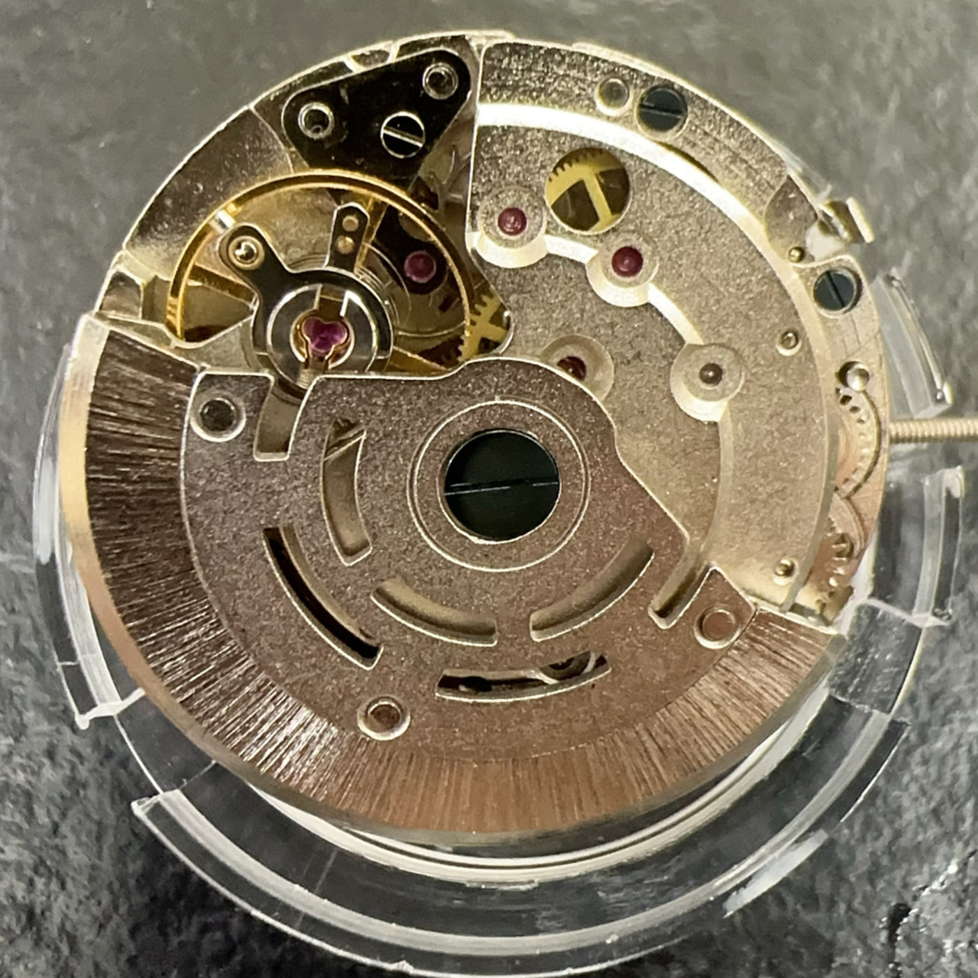 Dandong 4 Hands multifunctional automatic watch with mechanical movement and small seconds at 6 o'clock.