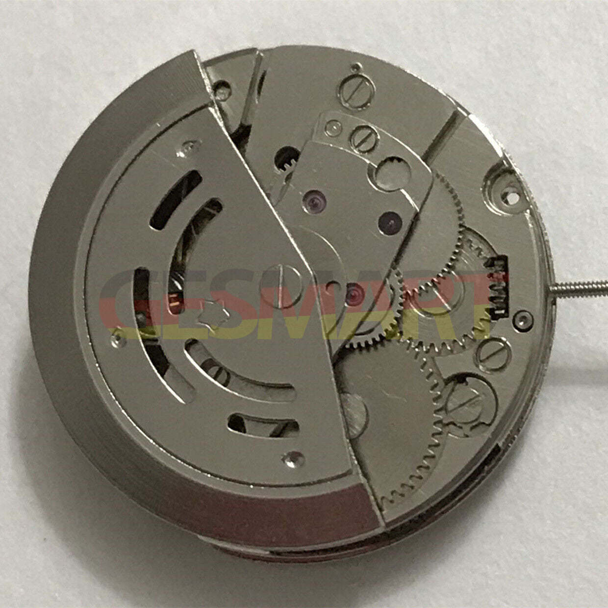 Dandong 7120 automatic watch with 3 hands and single calendar, China-made precision accessory.