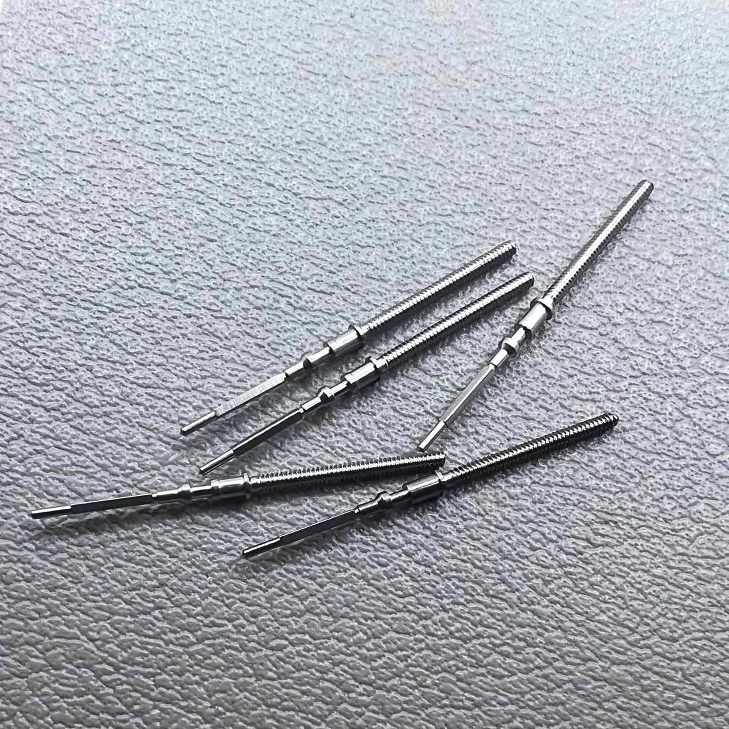 Set of 5 generic watch winding stems for YN55A, YN56A, YN84A, YN77 movements, compatible replacement parts.