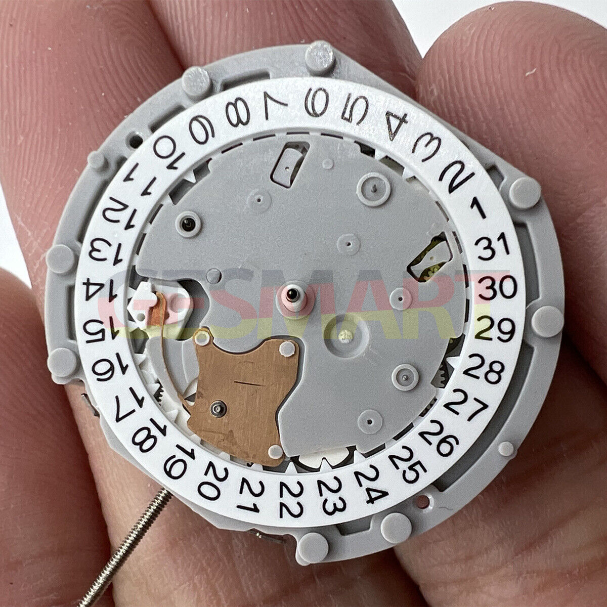 Sunon PE70 quartz watch movement with 3 hands, date at 3, and small seconds at 6 & 9 positions.