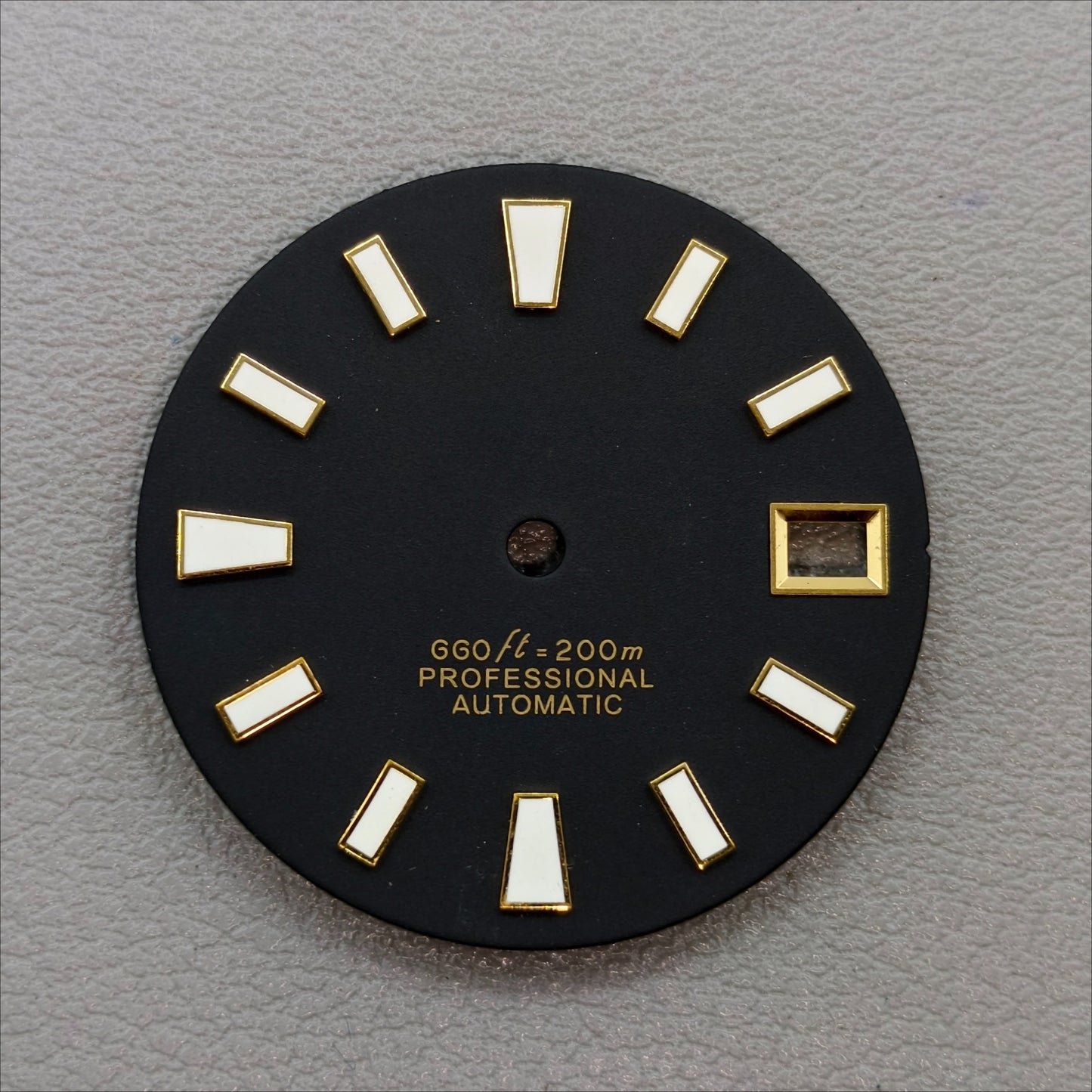 watch dial with S logo