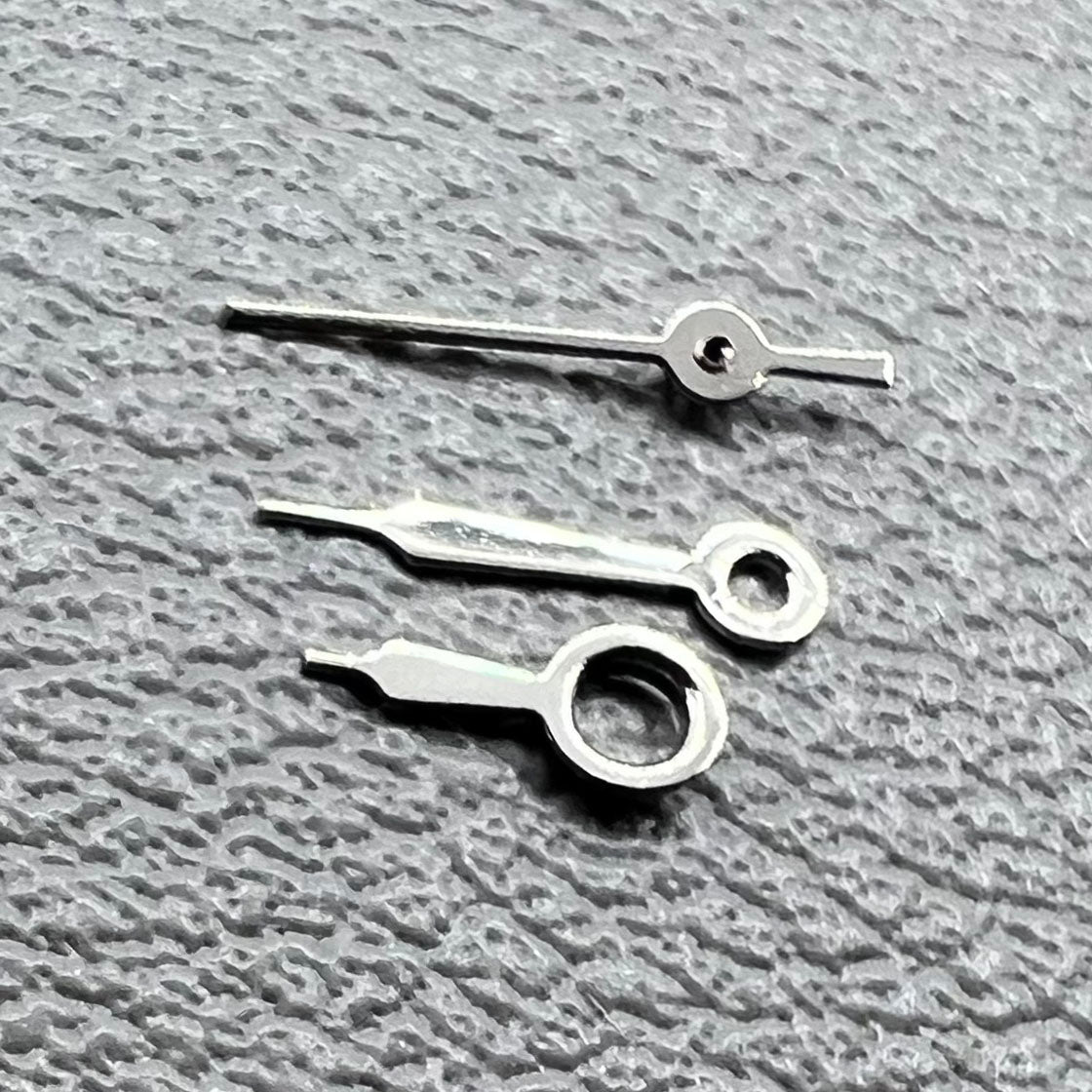 Silver watch hands set for Miyota 2035 movement, sizes 8mm/6mm/4mm, precise fit for repairs.